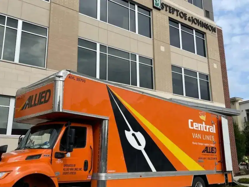 Central Van Lines movers packing an office